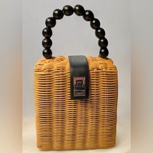 Little Wicker Handbag with beaded handle 
7”high 6” wide